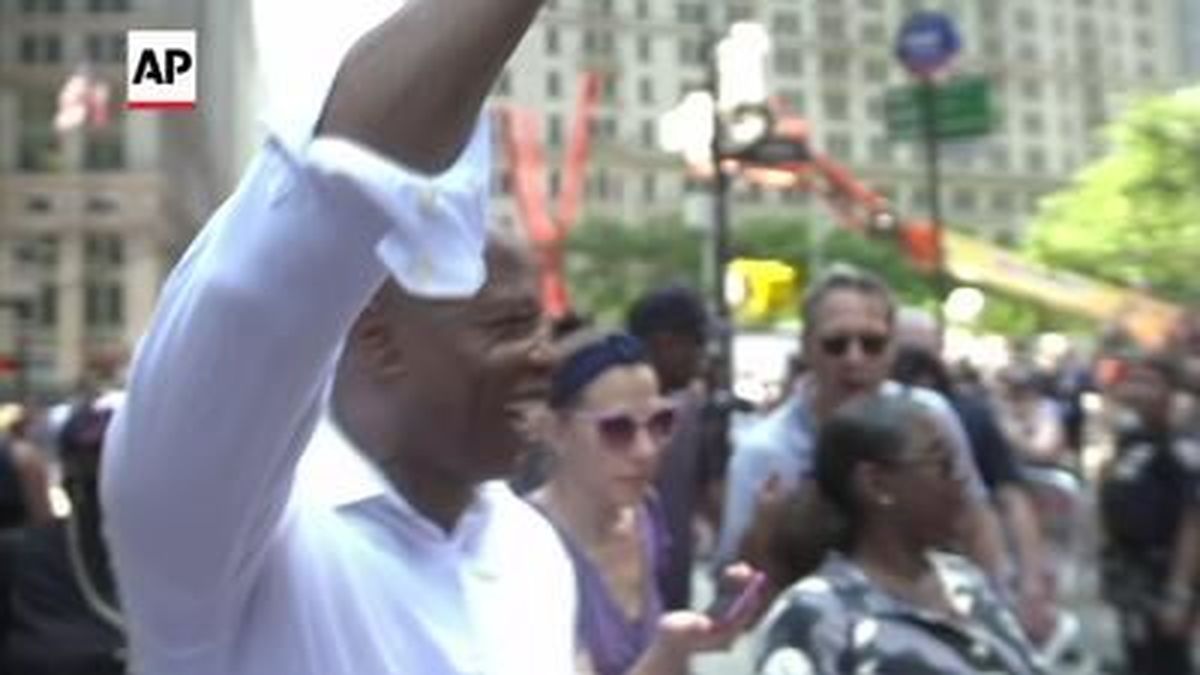 Democratic mayoral primary winner Eric Adams joined essential workers Wednesday for a parade honoring those who helped get New York City to the other side of the pandemic. He said it