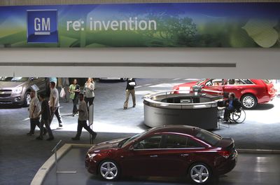 General Motors vehicles are displayed at the GM headquarters in Detroit. The path is now clear for General Motors Corp. to leave bankruptcy protection in record time. (Associated Press / The Spokesman-Review)