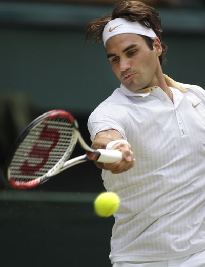 Roger Federer breezed through the first week at Wimbledon.  (Associated Press / The Spokesman-Review)