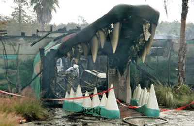 
Smoke rises after a blaze at Gatorland in Orlando, Fla., on Monday. 
 (Associated Press / The Spokesman-Review)