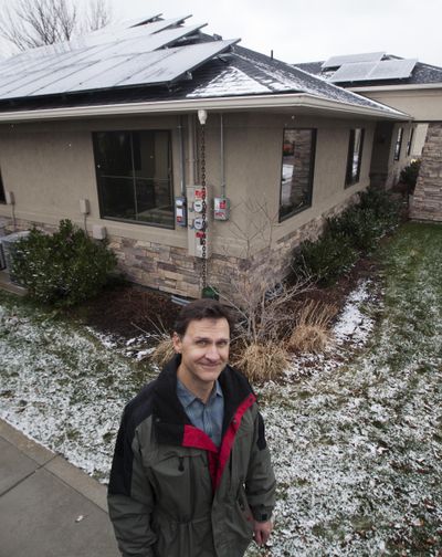 A solar panel array installed on s Boise office space as well as a home. (Darin Oswald / Idaho Statesman)