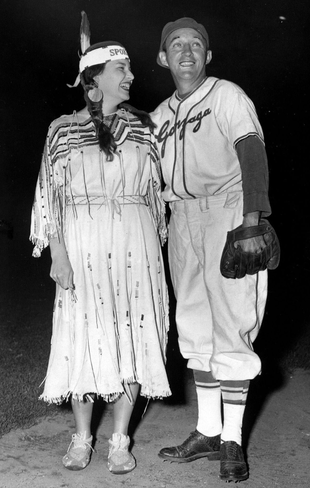 1950: Bing Crosby poses in August with Miss Spokane Glenda Bergen at a benefit softball game for Gonzaga High School. A crowd of nearly 6,000 at Ferris Field watched Crosby and his sons lose 7-6 to an American Legion team of Gonzaga players.