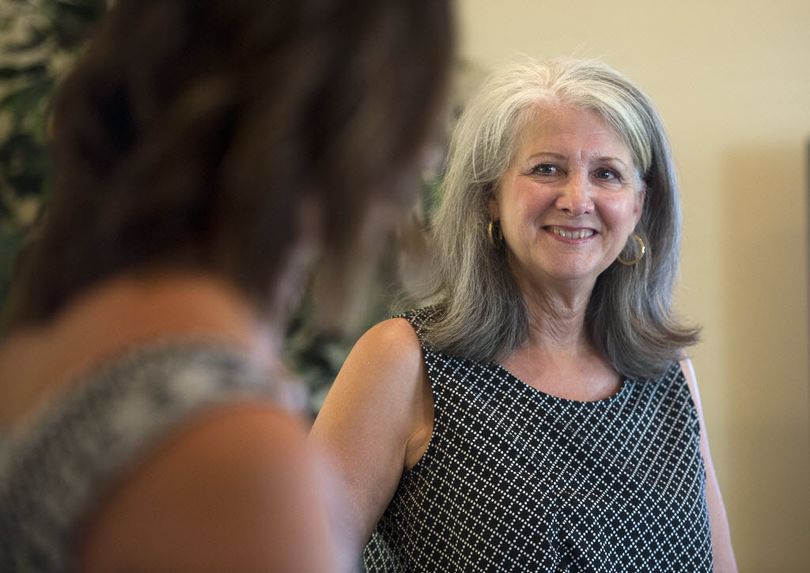 LaVerne Biel visits with her daughter, Brita Frost as they prepare for guests on election night, Aug. 4, 2015. (Dan Pelle / The Spokesman-Review)