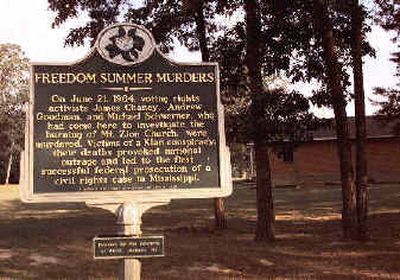
A historic marker outside Mt. Zion Church in rural Neshoba County, Miss., tells of the deaths of civil rights workers Michael Schwerner, Andrew Goodman and James Chaney, who were killed June 21, 1964, following the burning of the church. 
 (File/Associated Press / The Spokesman-Review)