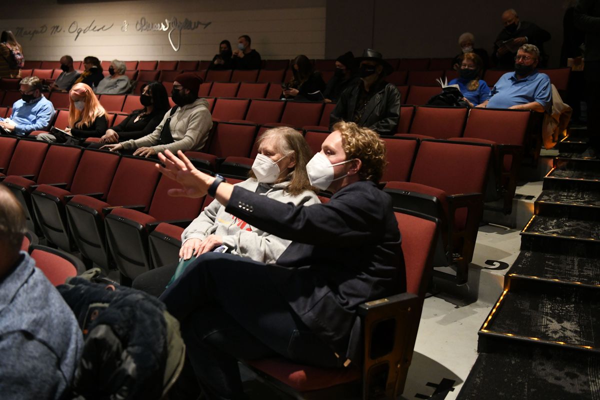 Spokane Civic Theatre show director Jean Hardie, center, and executive director Jake Schaefer take seats in the fifth row as the theater fills up for the opening of the Civic’s production of “The Play That Goes Wrong” on Jan. 28.  (Dan Pelle/The Spokesman-Review)