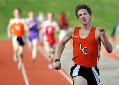 
Lewis and Clark's Kaleb Fergin finishes well in front of the pack in the 800-meter run at Ferris High School.
 (Rajah Bose / The Spokesman-Review)