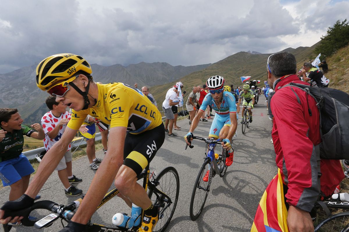 Britain's Chris Froome leads Italy's Vincenzo Nibali and Spain's Alberto Contador during climb. (Associated Press)