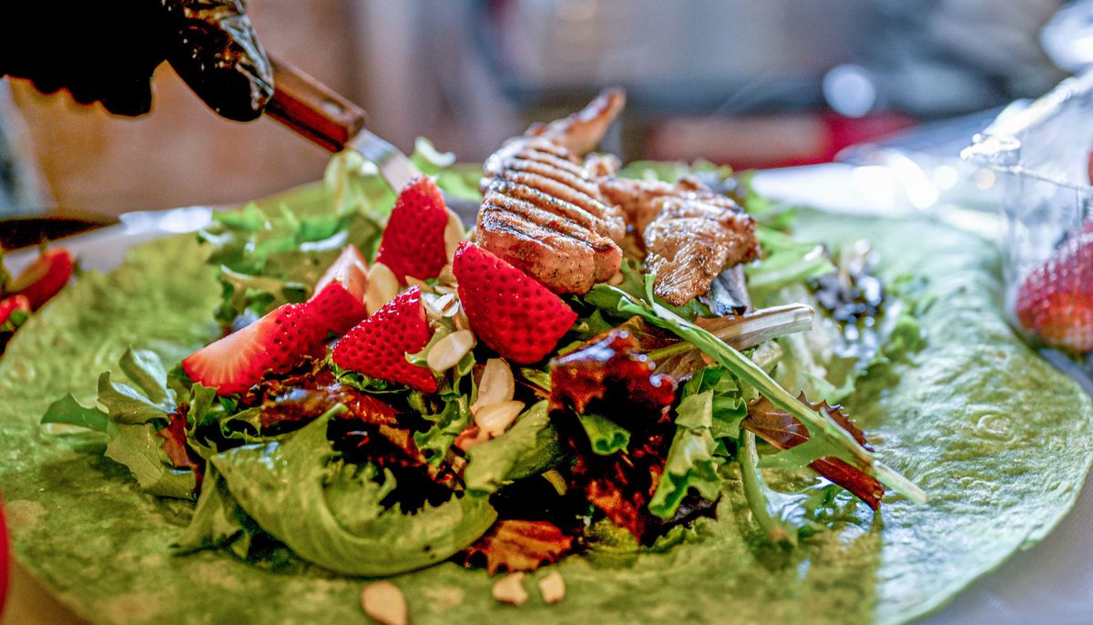 The strawberry wrap with chicken is served at Cultivated Chameleon in Spokane on May 27. The shop is described as “Sustainable fashion & trinkets meets coffee, tea and bites.” (Kathy Plonka/The Spokesman-Review)