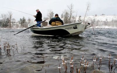 
Ice clings to shoreline brush as Stann Grater, left, and Jeff Holmes fish the upper Spokane River. The men are organizing anglers to speak up for the river's fishery. 
 (Rich Landers / The Spokesman-Review)
