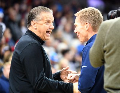 Coaches John Calipari, left, and Mark Few greet each other before the Kentucky-Gonzaga showdown during November 2022 at the Arena.  (By Jesse Tinsley/The Spokesman-Review)