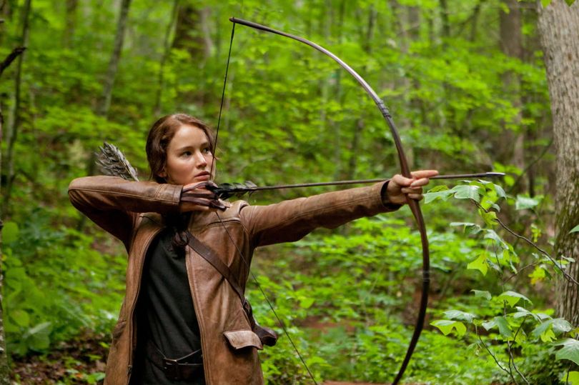 Jennifer Lawrence portrays Katniss Everdeen in a scene from 