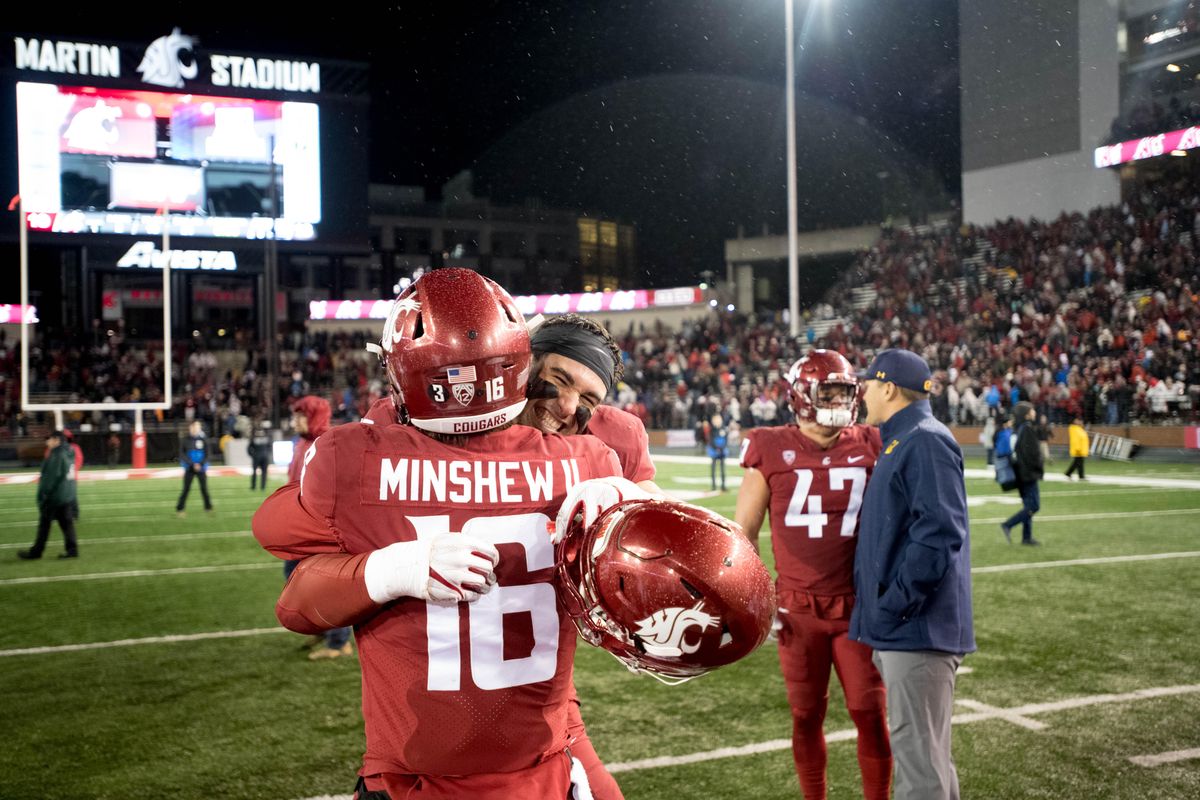 Washington State  defensive lineman Nick Begg  smiles while embracing quarterback Gardner Minshew  after defeating Cal  last Saturday  at Martin Stadium in Pullman. WSU won  19-13. (Tyler Tjomsland / The Spokesman-Review)