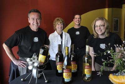 From left: Steve and Dana Trabun, along with Russ and Marlene Feist, have opened Barili Cellars at Second and Howard in downtown Spokane. (Dan Pelle / The Spokesman-Review)