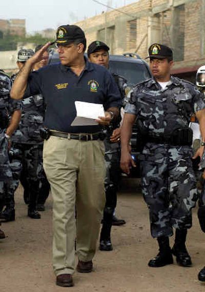 
 Honduran Security Minister Oscar Alvarez is shown in this Aug. 31 photo during a 