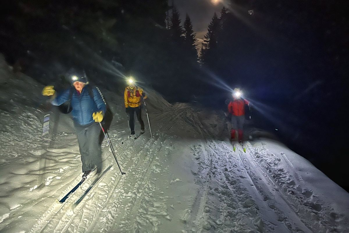 Tammy Bonney, left, Dave Peckham and Mike Bonney enjoy a full-moon ski outing at Palouse Divide.  (Photo courtesy of J. Michael Short)