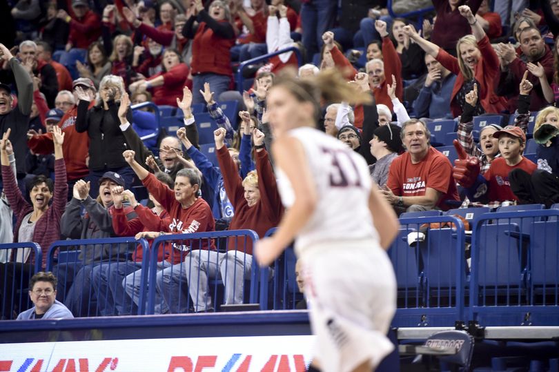 Fans react after Gonzaga guard Elle Tinkle (31) hit a three against Wyoming during overtime on Thursday, Dec 3, 2015, at McCarthey Athletic Center in Spokane, Wash. Gonzaga won the game 61-57 in overtime. (Tyler Tjomsland / The Spokesman-Review)