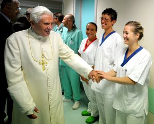 ORG XMIT: AOS101 In this photo provided by the Vatican newspaper L'Osservatore Romano, Pope Benedict XVI greets hospital staff as he leaves the Regional Hospital after a surgery on his right wrist, seen in a cast, in Aosta, northern Italy, Friday, July 17, 2009. Benedict XVI emerged smiling from the hospital Friday after undergoing surgery for a broken wrist due to a fall at his Alpine vacation chalet. Doctors said his right arm would be in a cast for a month.  (AP Photo/L'Osservatore Romano, ho) **EDITORIAL USE ONLY** (The Spokesman-Review)