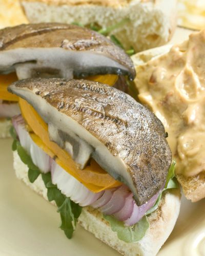 A Portobello Burger with Sun-dried Tomato Mayo is a way to  treat yourself to a vegetarian burger that is a step above the usual fare. (Associated Press)