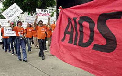 
Thai activists march on the opening day of the 15th International AIDS Conference, in Bangkok, Thailand, on Sunday. 
 (Associated Press / The Spokesman-Review)