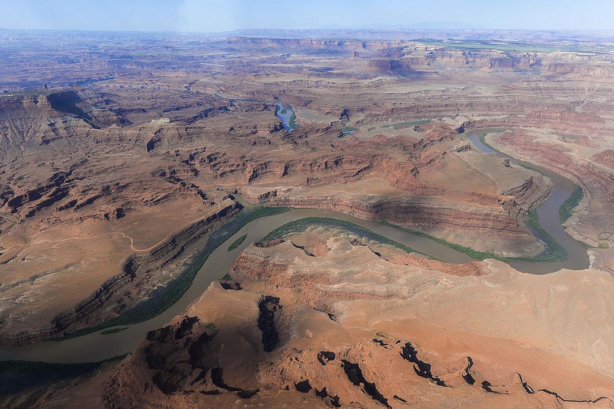 This May 23, 2016,  photo shows the northernmost boundary of the proposed Bears Ears region, along the Colorado River, in southeastern Utah. President Donald Trump signed an executive order  April 26, 2017, directing his interior secretary to review the designation of dozens of national monuments on federal lands, as he singled out “a massive federal land grab” by the Obama administration. (Francisco Kjolseth / The Salt Lake Tribune)