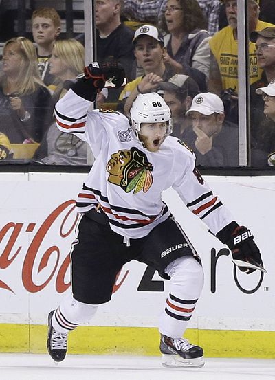 Blackhawks right wing Patrick Kane celebrates his Game 4 goal against Boston. (Associated Press)