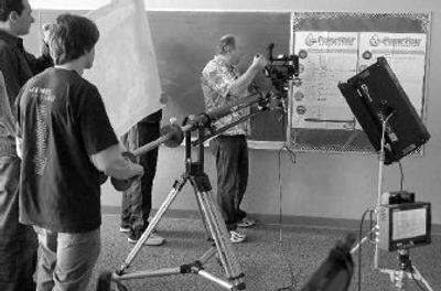 
Dave Marlin of Marlin Video Productions shoots an ad for the Boys & Girls Club of Spokane County on Tuesday. Marlin has teamed with Cue 11 Entertainment for many productions. 
 (Dan Pelle / The Spokesman-Review)