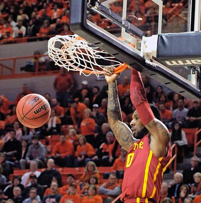 Iowa State's DeAndre Kane dunks the ball during the Cyclones’ triple-overtime win at Oklahoma State. (Associated Press)