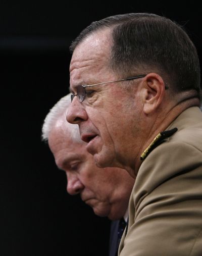 Defense Secretary Robert Gates, left, and Joint Chiefs Chairman Adm. Michael Mullen hold a news conference Thursday at the Pentagon in Arlington, Va.  (Associated Press / The Spokesman-Review)