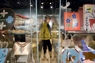 At the Northwest Museum of Arts and Culture on Friday, Lois Paul walks through the Native American artifacts collection. The state wants to cut museum funding for both the Western Washington Historical Society museum in Tacoma and the Eastern Washington Historical Society/Museum of Arts and Culture in Spokane.  (Colin Mulvany / The Spokesman-Review)