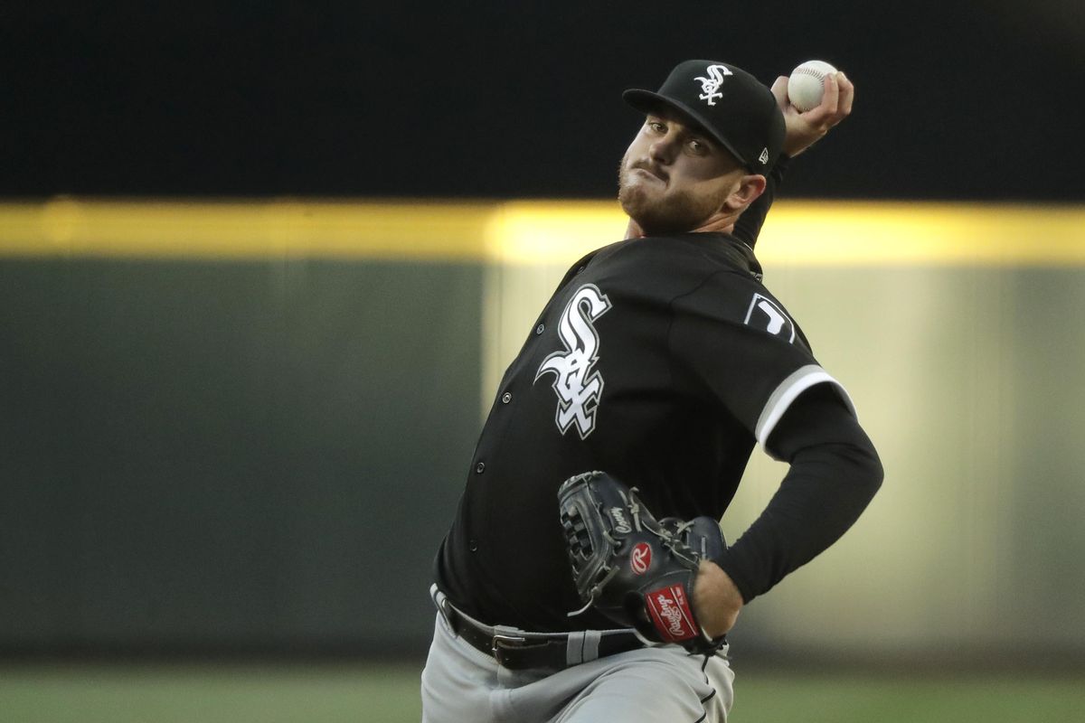 Chicago White Sox starting pitcher Dylan Covey throws to a Seattle Mariners batter during the third inning  Saturday in Seattle. (Ted S. Warren / AP)