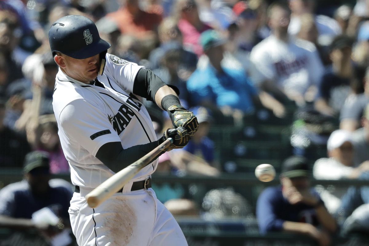 Ryon Healy hits a two-RBI double in the eighth inning of Sunday’s game against the Minnesota Twins in Seattle. Healy’s double and Kyle Seager’s solo home run provided the runs in the Mariners’ 3-1 victory. (Ted S. Warren / Associated Press)