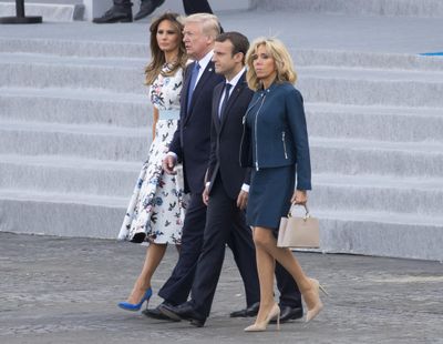President Donald Trump, first lady Melania Trump, French President Emmanuel Macron, and and his wife Brigitte Macron, walk from the viewing stand a the conclusion of the Bastille Day parade on the Champs Elysees avenue in Paris, Friday, July 14, 2017. (Carolyn Kaster / Associated Press)