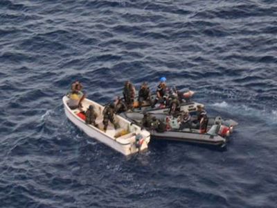 French military officers aboard two dinghies, right, intercept a small vessel of pirates 550 miles east of the Kenyan port of Mombasa on Wednesday. (Associated Press / The Spokesman-Review)