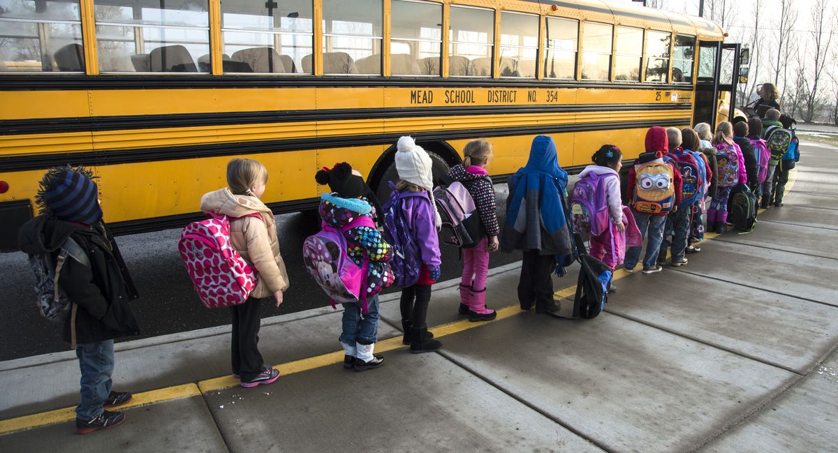 Kindergartners at Prairie View Elementary School line up to be bused home Thursday at the conclusion of a school day. Prairie View, the newest elementary in the Mead School District, opened seven years ago but has long operated at its capacity of 600 students. (Colin Mulvany)