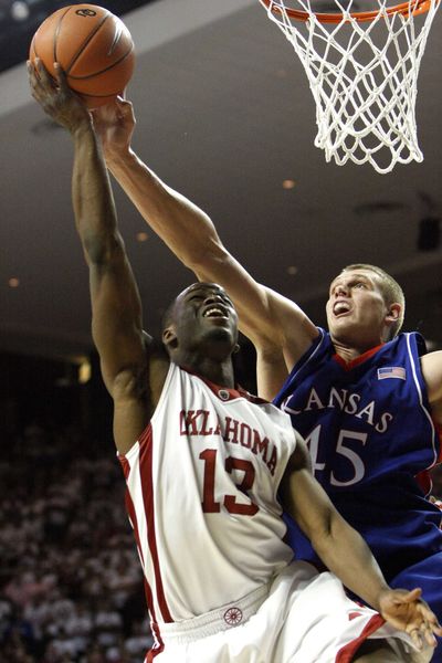 Oklahoma was denied by Kansas in large part to Cole Aldrich (right).  (Associated Press / The Spokesman-Review)