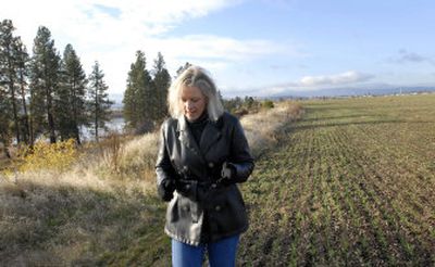 
The Spokesman-ReviewCindy Marshall is determined that Otis Orchards has personified the down-to-earth lifestyle with plenty of hometown warmth, expansive five-acre homesteads and an array of farm animals and hearty chores that are part of a rural lifestyle worth fighting for. She walked next to a remaining large tract of irrigated farmland on the Spokane River that could be ripe for development.
 (J. BART RAYNIAK / The Spokesman-Review)