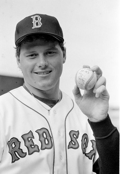 Boston Red Sox pitcher Roger Clemens poses with the game ball at Fenway Park in Boston, Mass., Wednesday, April 30, 1986. On April 29, 1986, Clemens set a major league record by striking out 20 batters as the Red Sox defeated the Seattle Mariners 3-1.  (Associated Press)