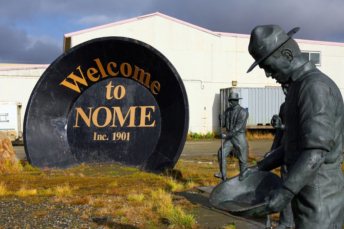 A giant gold pan welcomes visitors to Nome, Alaska, 29 Sept. 2006. The discovery of gold by Norwegian Jafet Lindeberg and Swedes Erik Lindblom and John Brynteson in 1898 in nearby Anvil Creek, led to the founding of Anvil City, later renamed Nome. The city, 200 miles (321kms) from the Russian east coast and 560 miles (901kms) northwest of Anchorage, also claims the finish line of the Iditarod Trail annual dog sled race.  (Gabriel Bouys/Getty Images North America/TNS)