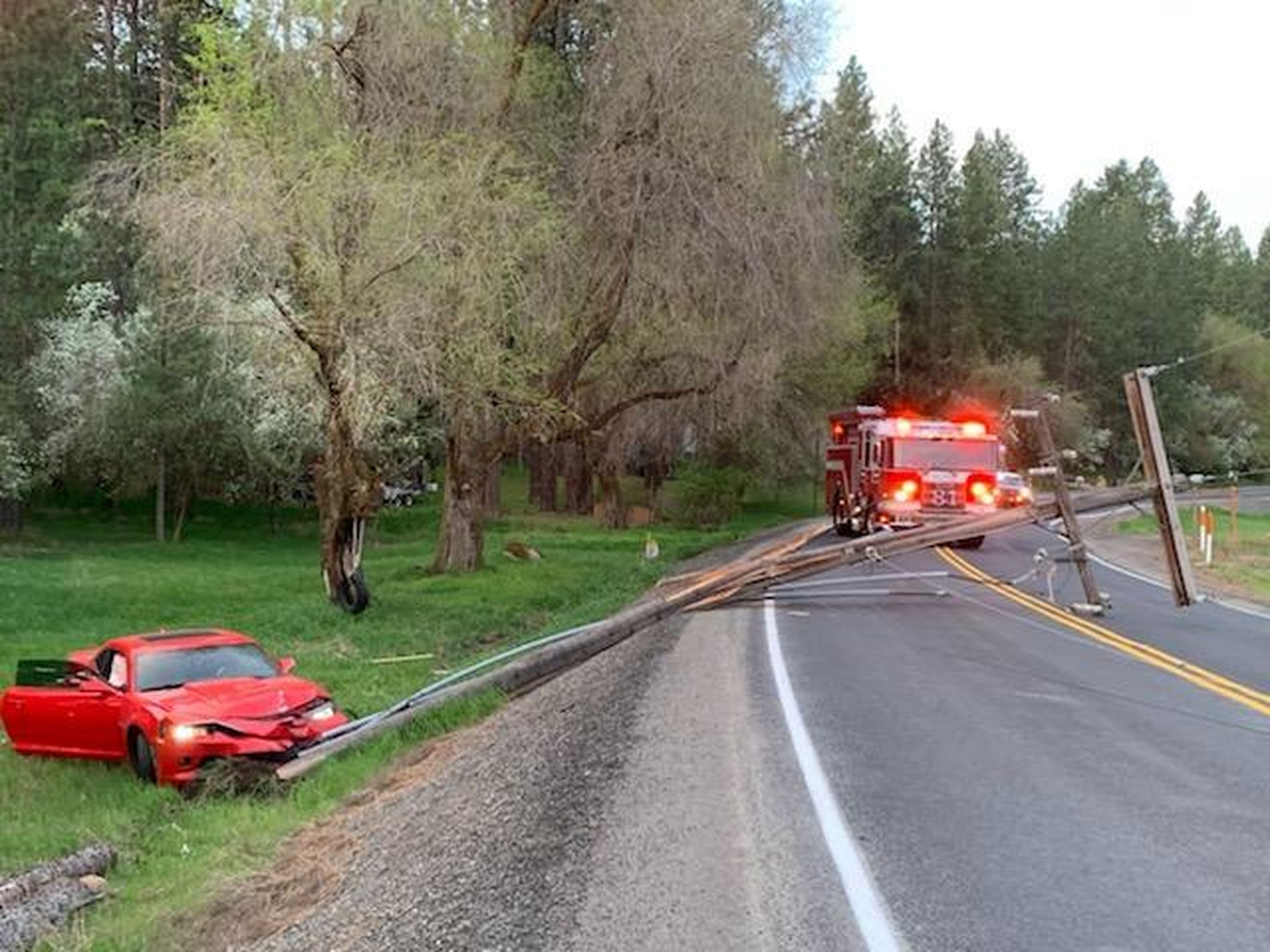 Car Crashes Into Power Pole Causes Outages The Spokesman Review