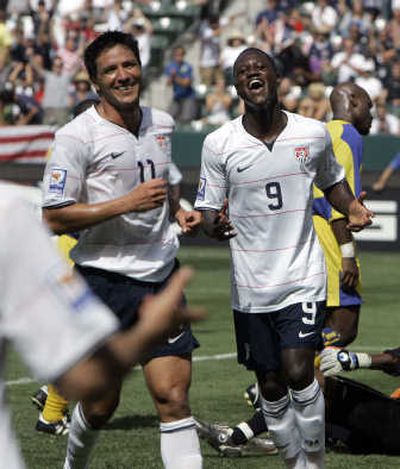 
Associated Press Brian Ching, left, scored two goals and Eddie Johnson one for the U.S.
 (Associated Press / The Spokesman-Review)