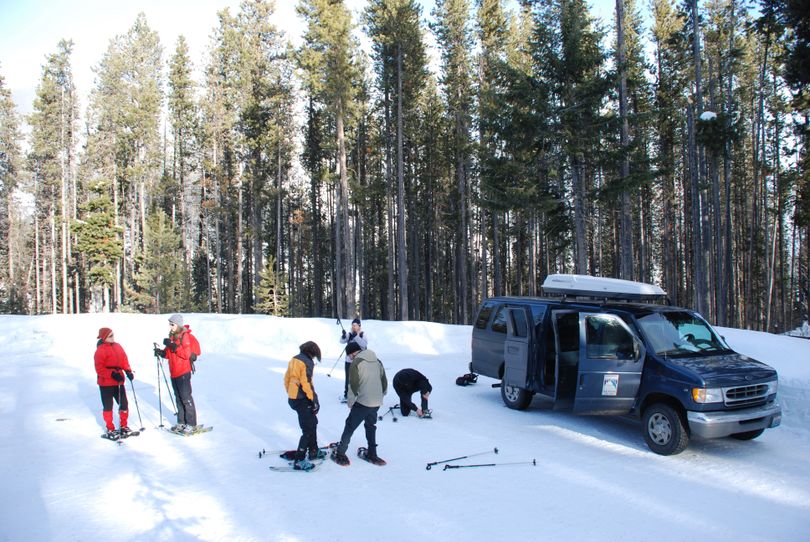 A group of snowshoers readies to leave the Spokane Parks and Recreation Department van at the Sno-Park lot at Sherman Pass before setting off on one of the department's organized backcountry snowshoeing treks.   RICH LANDERS The Spokesman-Review (The Spokesman-Review)