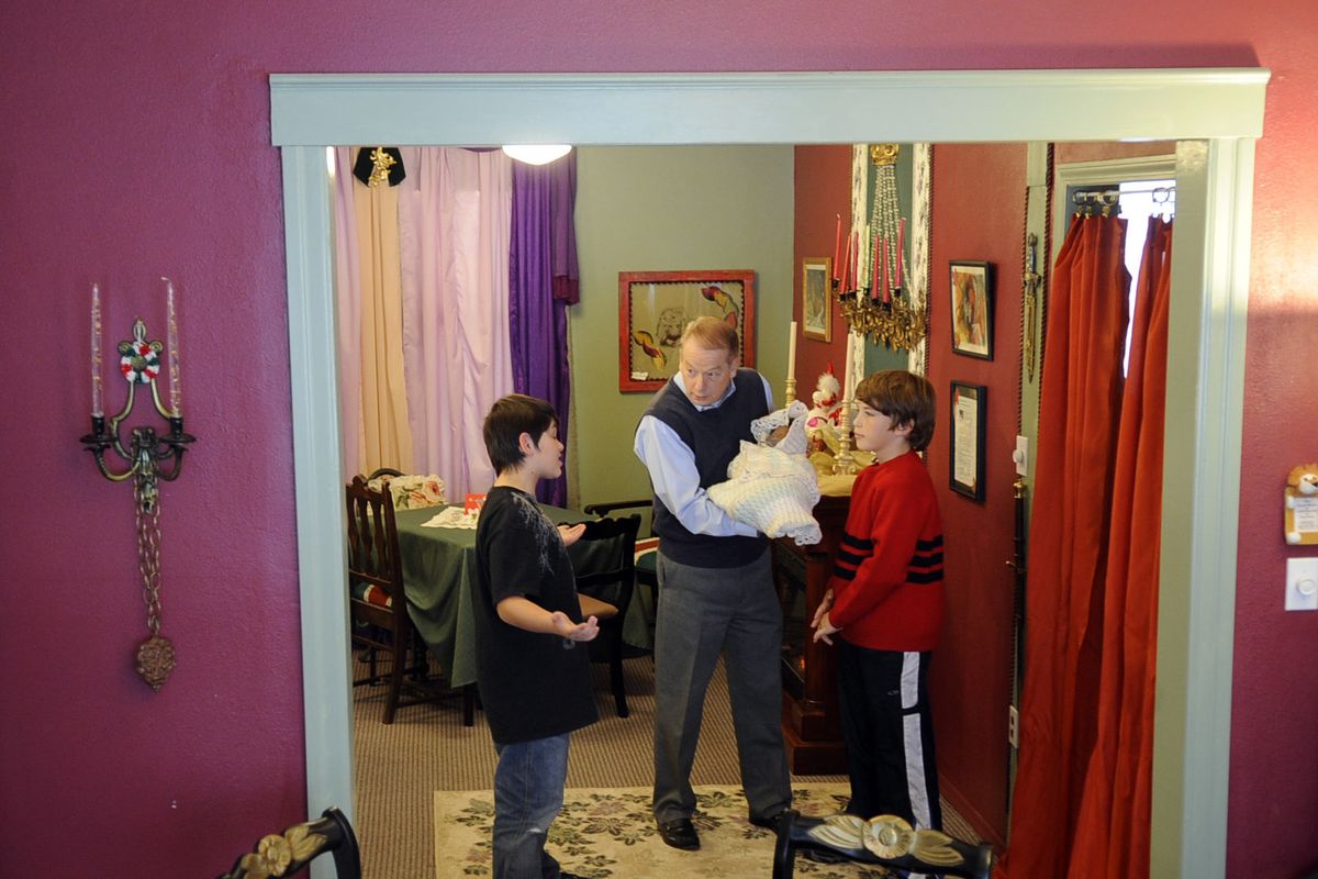 Jim Becker, center, rehearses with Jacob Rosenberg, left, and Caelan Angell. The Lion’s Share  will be producing “Kidnapping Christmas” the first two weekends in December.  (Christopher Anderson)