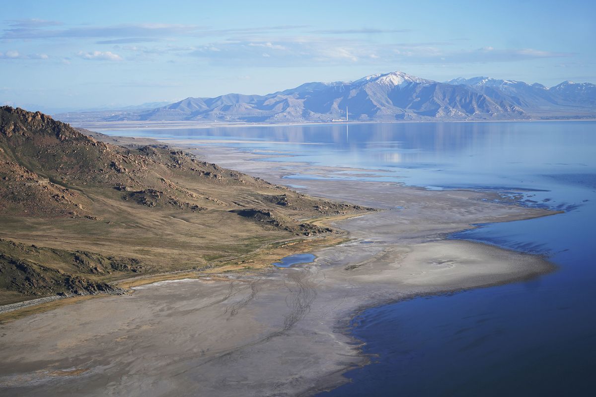 FILE - The Great Salt Lake recedes from Anthelope Island on May 4, 2021, near Salt Lake City. The water levels at the Great Salt Lake have hit a historic low, a grim milestone for the largest natural lake west of the Mississippi River that comes as a megadrought grips the region.  (Rick Bowmer)
