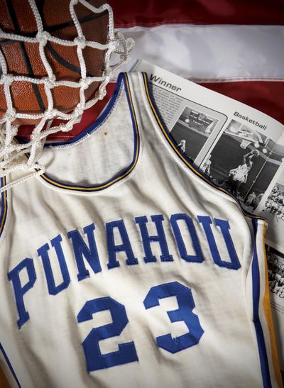 This undated photo released by Heritage Auctions shows a Punahou High School basketball jersey worn by former student Barack Obama. (Associated Press)