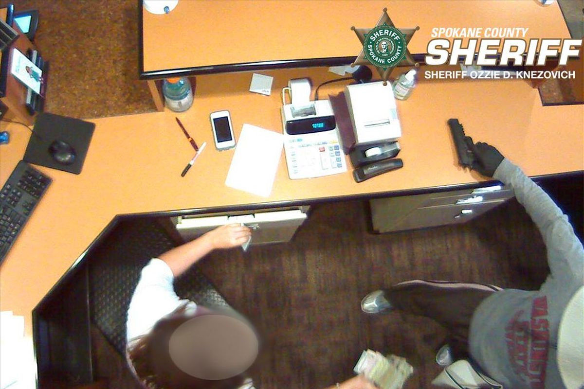 Images from a surveillance camera during a bank robbery in Spokane Valley on Thursday, June 30. (Spokane County Sheriff’s Office / Courtesy)