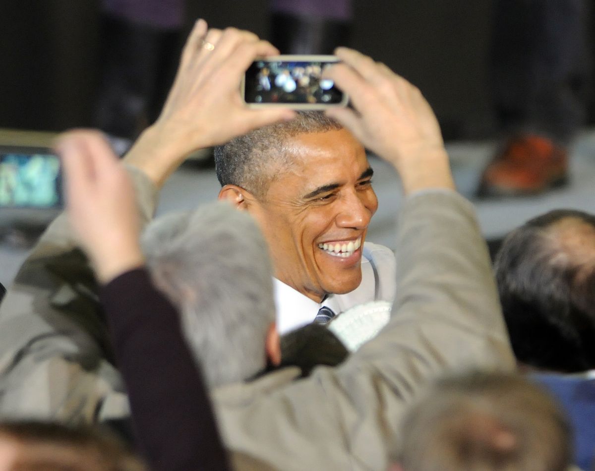 President Barack Obama shakes hands after speaking to a crowd of about 6,600 people inside the Caven Williams Sports Complex during a visit to Boise State University, Wednesday, Jan. 21, 2015 in Boise. It was President Obama