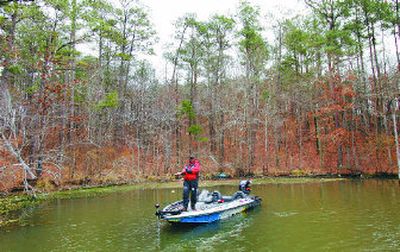 
Pro angler Ish Monroe scouts Alabama waters preceding the recent Bassmasters Classic. Born in the South, big-time national bass tournaments are expanding to the Columbia River this fall.
 (File photos Associated Press / The Spokesman-Review)