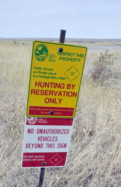 Signs mark at least 67 private properties in five Eastern Washington counties that have been enrolled into the Washington Department of Fish and Wildlife's new Hunt by Reservation access program before the 2013 fall seasons. (Rich Landers)