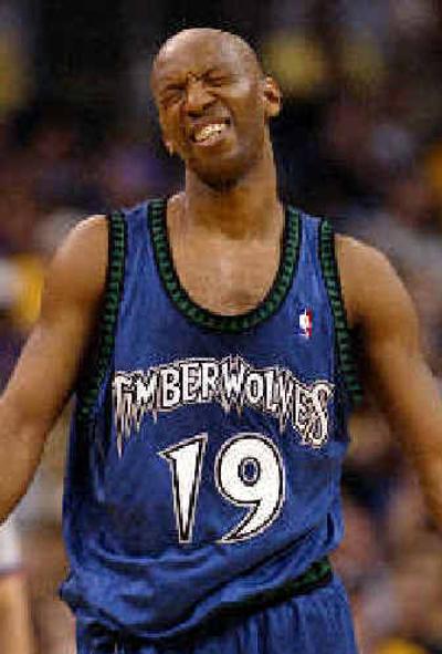 
Minnesota point guard Sam Cassell winces after being poked in the eye by Los Angeles' Karl Malone during the third quarter of Game 3 on Tuesday. Minnesota point guard Sam Cassell winces after being poked in the eye by Los Angeles' Karl Malone during the third quarter of Game 3 on Tuesday. 
 (Associated PressAssociated Press / The Spokesman-Review)