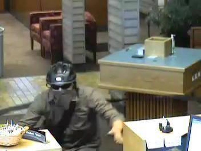 A gunman robbed the Wells Fargo Bank at 114 E. Appleway in Coeur d'Alene Friday about 6 p.m., then escaped on a bicycle. Anyone with information is asked to call Coeur d'Alene police at (208) 769-2320 or the FBI at (208) 664-5128.
Investigators do not believe the robbery is related to a series of bank robberies in Spokane that have been attributed to a man who typically escapes on a bike.
 (Coeur d'Alene Police Department)